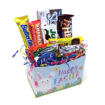 An Easter-themed box with candy bars stuffed inside